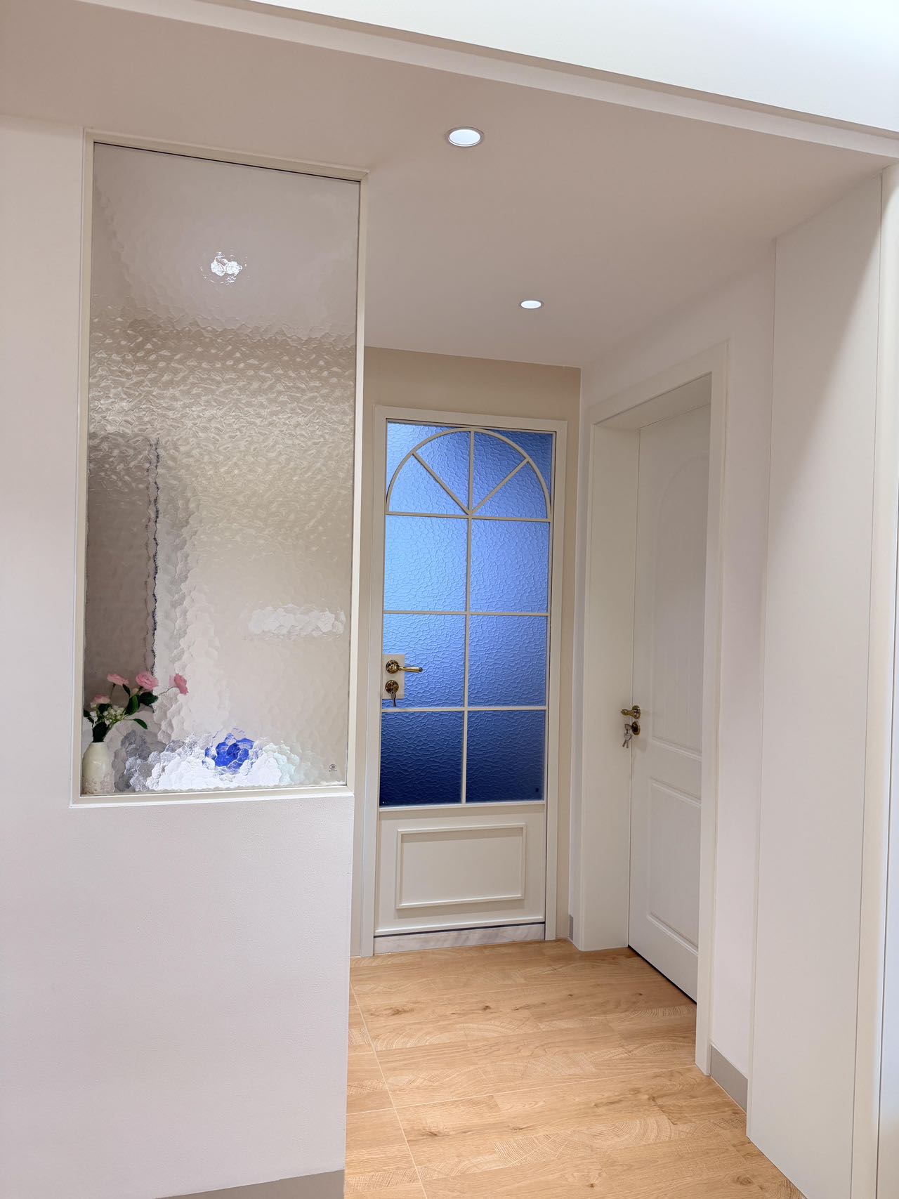 Light Wood-Effect Flooring Throughout a Home — Hallway | Continuity Around Every Turn
