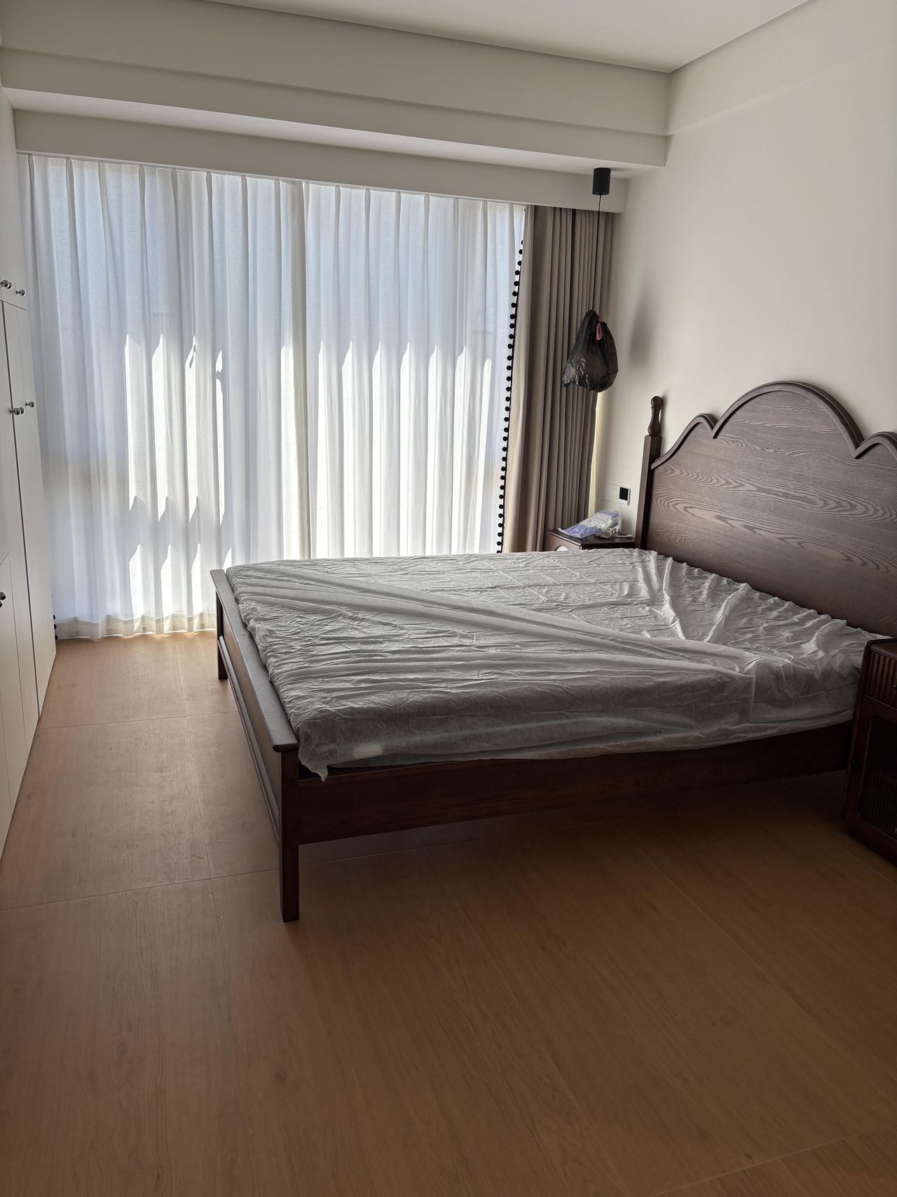 Light Brown Wood-Effect Tiles Throughout a Home — Bedroom | Layers of Light and Dark Wood
