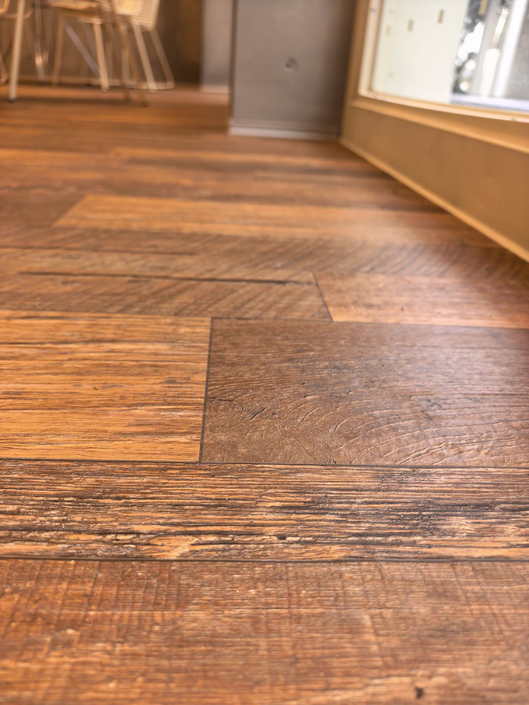 Reclaimed-Timber-Effect Tiles in a Commercial Interior — Joints Seen Up Close