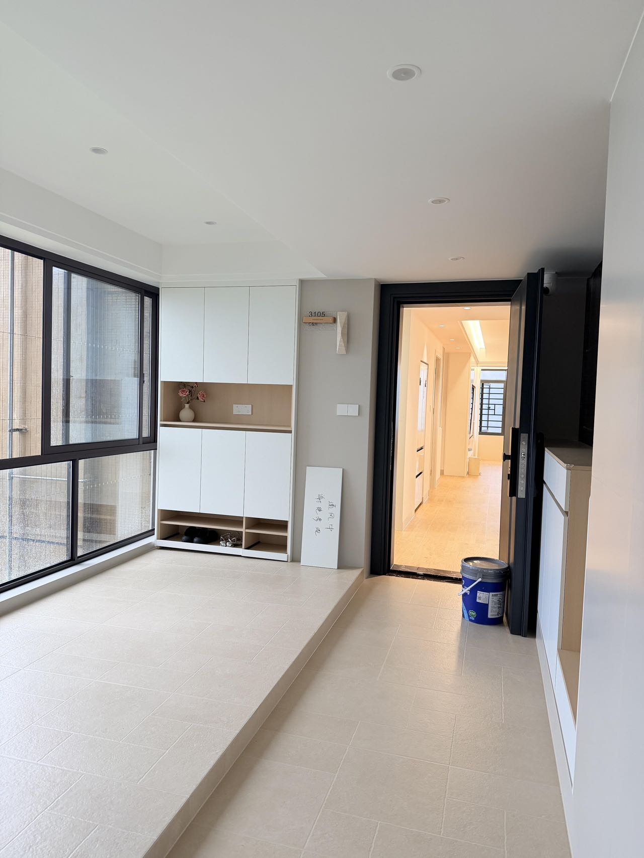 Light Wood-Effect Flooring Throughout a Home — Living Room Corner | Leaving Space for the View