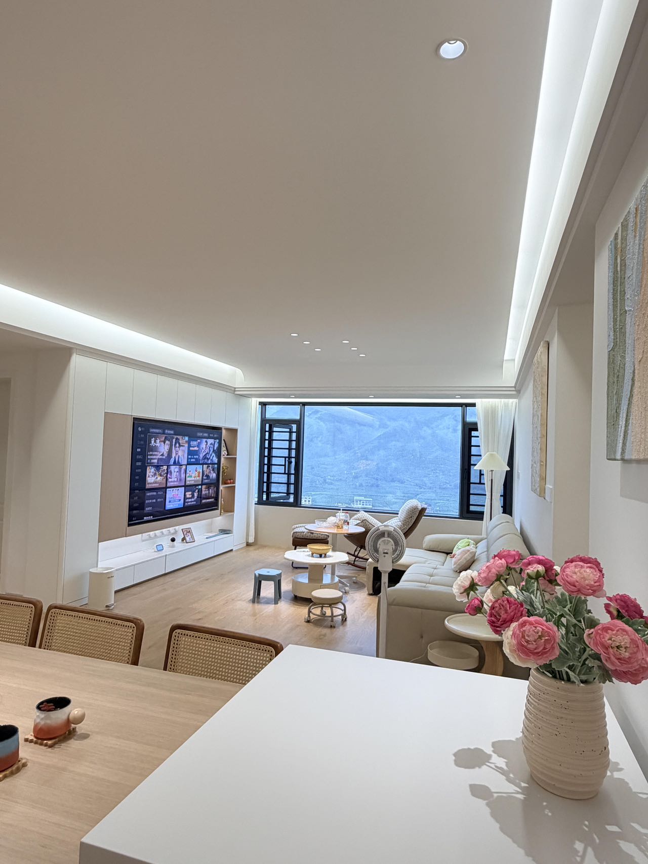 Light Wood-Effect Flooring Throughout a Home — Living and Dining | Wood Tones and Open Space