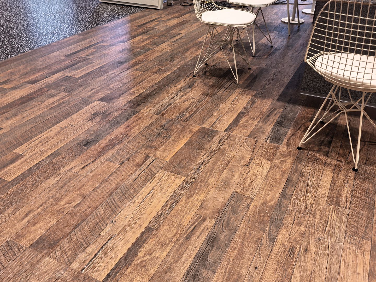 Reclaimed-Timber-Effect Tiles in a Commercial Interior — Guest Seating