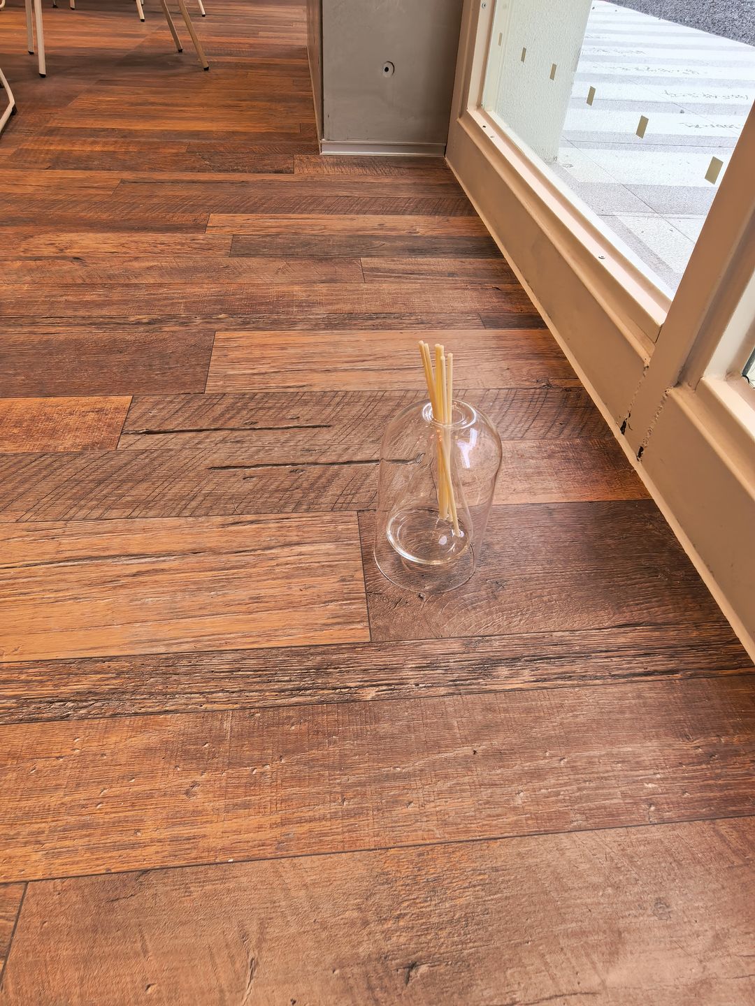 Reclaimed-Timber-Effect Tiles in a Commercial Interior — A Corner by the Window