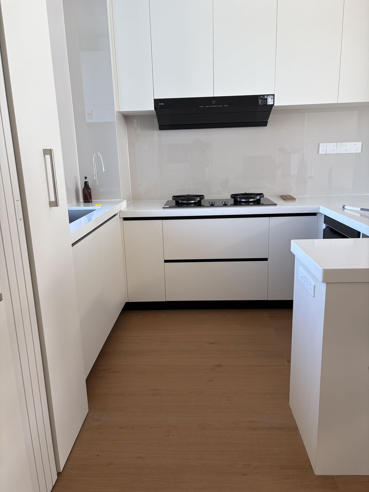 Light Brown Wood-Effect Tiles Throughout a Home — Kitchen | White and Black, Grounded in Wood Tones